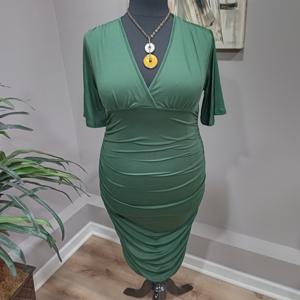 Source Unknown  Plus Size Chic Forest Green Midi Ruched Dress